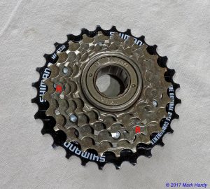 Shimano 6 spd entry level freewheel some showing ramp positions.